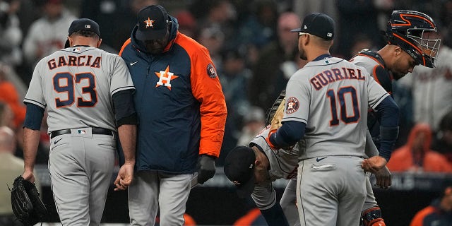 Houston Astros manager Dusty Baker Jr. takes relief pitcher Yimi Garcia out of the game during the sixth inning in Game 3 of baseball's World Series between the Astros and the Atlanta Braves Friday, Oct. 29, 2021, in Atlanta.