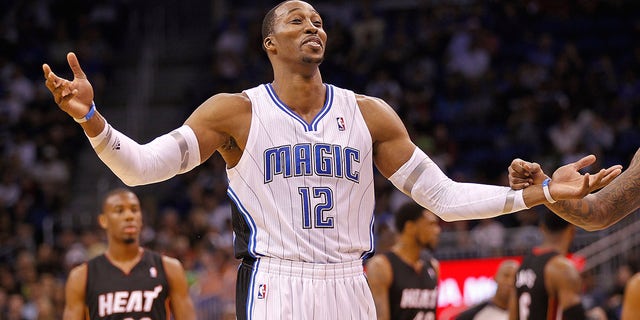 Dwight Howard, as a member of the Orlando Magic, argues a call during a game against the Miami Heat on Dec. 21, 2011, in Orlando, Florida.