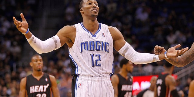 Dwight Howard, as a member of the Orlando Magic, argues a call during a game against the Miami Heat on Dec. 21, 2011, in Orlando, Florida.