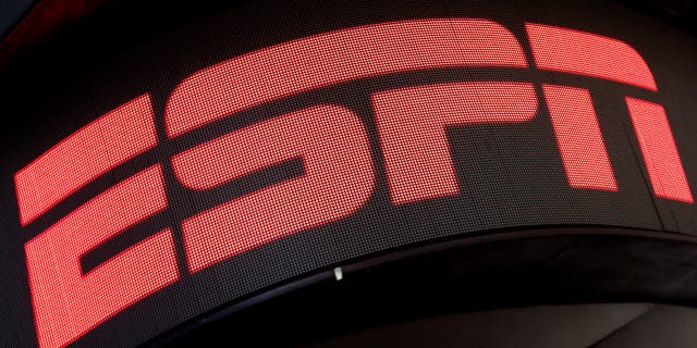 The ESPN logo is seen on an electronic display in Times Square in New York City on August 23, 2017.