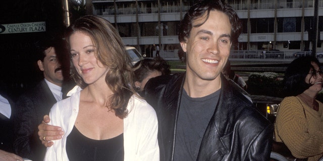 Actress Brandon Lee and girlfriend Eliza Hutton are attending the premiere of 'Alien 3'.