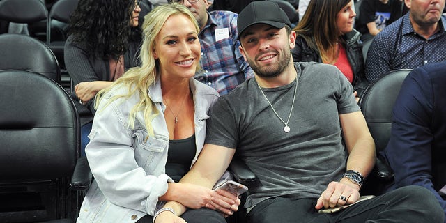 Baker Mayfield and Emily Wilkinson attends a basketball game beween the Los Angeles Clippers and the New Orleans Pelicans at Staples Center on March 6, 2018 in Los Angeles, California. 