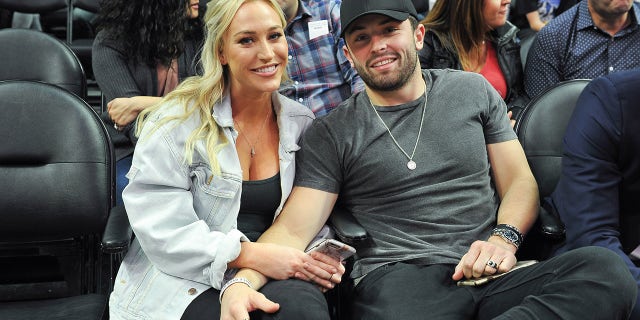 Baker Mayfield and Emily Wilkinson attends a basketball game beween the Los Angeles Clippers and the New Orleans Pelicans at Staples Center on March 6, 2018 in Los Angeles, California.