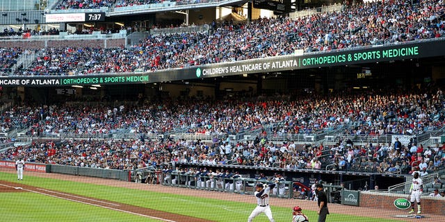 Atlanta, Georgia, USA; Atlanta Braves first baseman Freddie Freeman (5) bats during the first inning of their game against the Philadelphia Phillies at Truist Park on May 9, 2021.