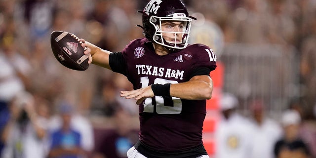 Texas A&M quarterback Zach Calzada looks for a receiver during the first half of the team's NCAA college football game against Alabama on Saturday, Oct. 9, 2021, in College Station, Texas.