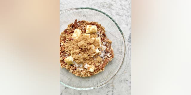The crisp portion of Debi Morgan's recipe is made with granola, chopped pecans, cinnamon, brown sugar, flour and butter.