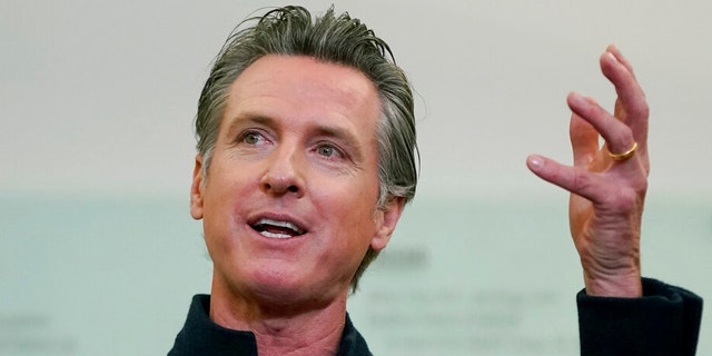 Gov. Gavin Newsom speaks at a news conference in Oakland, Calif., on Oct. 27, 2021. Gov. Newsom has changed plans and won't be going to the upcoming United Nations Climate Change Conference in Glasgow, Scotland. Newsom's office cited "family obligations" as the reason.