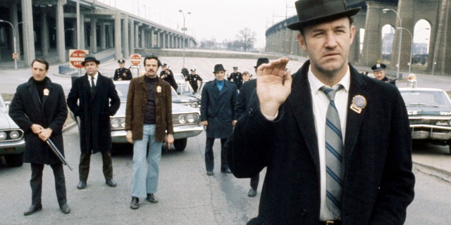 American actor Gene Hackman (right) is seen as Jimmy 'Popeye' Doyle in 'The French Connection', directed by William Friedkin, 1971.