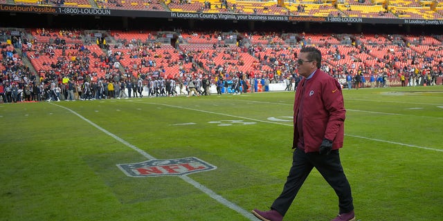 Washington Redskins owner Dan Snyder walks off the field before his Redskins  lose to the Houston Texans at FedEX Field on November 18, 2018, in Landover, MD. 