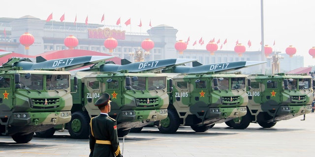 BEIJING, CHINA - OCTOBER 1, 2019: DF-17 Dongfeng medium range ballistic missiles equipped with a DF-ZF hypersonic glide vehicle, involved in a military parade to mark the 70th anniversary of the People's Republic of China.  Zoya Rusinova / TASS (Photo by Zoya RusinovaTASS via Getty Images)