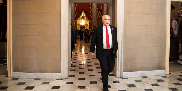 UNITED STATES - DECEMBER 18: Rep. Mike Kelly, R-Pa., walks through the hallway outside of Statuary Hall. (Photo by Caroline Brehman/CQ-Roll Call, Inc via Getty Images)