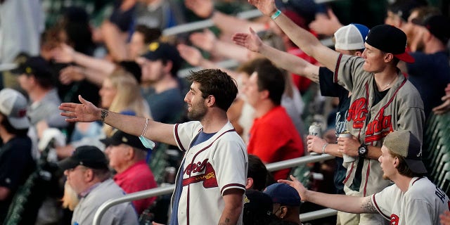 ATLANTA, GA - APRIL 27: The fans do The Chop during the Tuesday night MLB game between the Atlanta Braves and the Chicago Cubs on April 27, 2021 at Truist Park in Atlanta, Georgia.