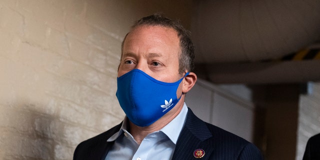 Reps. Josh Gottheimer, D-N.J., arrives for a meeting of the House Democratic Caucus on the infrastructure bill in the U.S. Capitol on Friday, oct. 1, 2021.