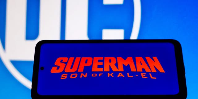 In this 2012 photo illustration, the Superman: Son of Kal-El logo is displayed on a smartphone. (Photo Illustration by Rafael Henrique/SOPA Images/LightRocket via Getty Images)