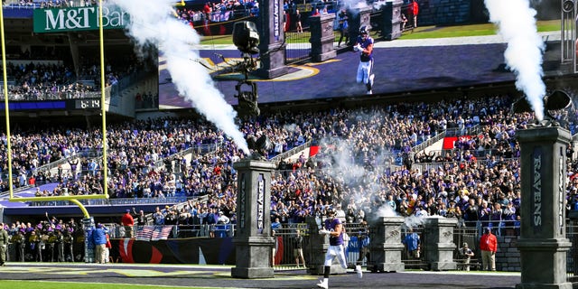 Baltimore Ravens tight end Mark Andrews (89) is introduced to the crowd before a game against the Los Angeles Chargers Oct. 17, 2021 at M and T Bank Stadium in Baltimore. 