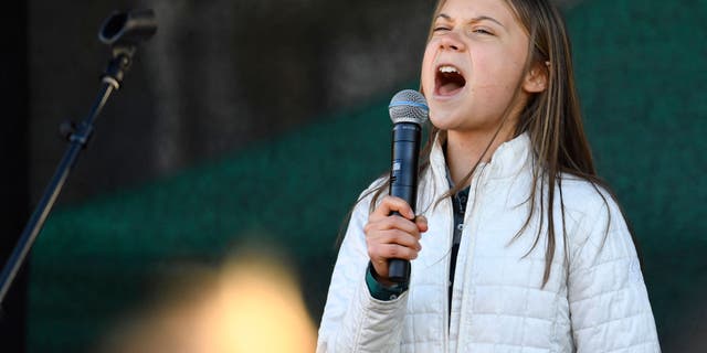 Swedish climate activist Greta Thunberg speaks during a climate strike demonstration of Fridays for Future in Stockholm, Sweden, on October 22, 2021. - Sweden OUT (Photo by Erik SIMANDER / TT News Agency / AFP) / Sweden OUT (Photo by ERIK SIMANDER/TT News Agency/AFP via Getty Images)