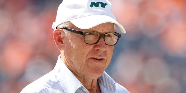 Owner Woody Johnson of the New York Jets watches from the sidelines before their game against the Denver Broncos at Empower Field At Mile High on Sept. 26, 2021 in Denver, Colorado. 