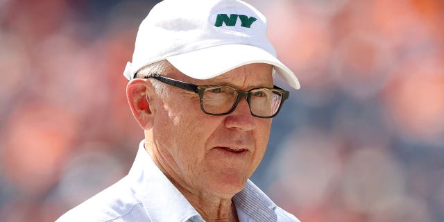 Owner Woody Johnson of the New York Jets watches from the sidelines before their game against the Denver Broncos at Empower Field At Mile High on Sept. 26, 2021 in Denver, Colorado. 