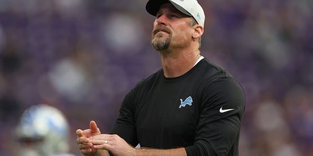 Head coach Dan Campbell of the Detroit Lions looks on before the game against the Green Bay Packers at U.S. Bank Stadium October 10, 2021 in Minneapolis, Minn.