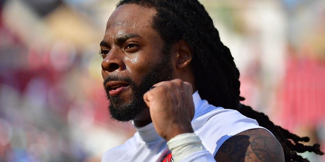 TAMPA, FLORIDA - OCTOBER 10: Richard Sherman #5 of the Tampa Bay Buccaneers reacts after defeating the Miami Dolphins 45-17 at Raymond James Stadium on October 10, 2021 in Tampa, Florida. (Photo by Julio Aguilar/Getty Images)