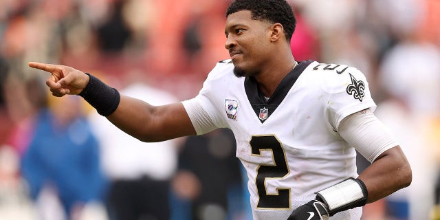 Jameis Winston of the New Orleans Saints celebrates after a game against the Washington Football Team at FedExField on Oct. 10, 2021, in Landover, Maryland.