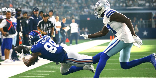 Evan Engram (88) of the New York Giants catches the ball during the third quarter against the Dallas Cowboys at AT&T Stadium on Oct. 10, 2021, in Arlington, Texas.