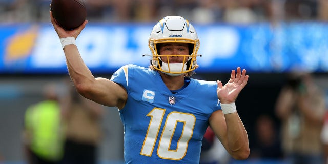 INGLEWOOD, CALIFORNIA - OCTOBER 10: Justin Herbert #10 of the Los Angeles Chargers at SoFi Stadium on October 10, 2021 in Inglewood, California. (Photo by Ronald Martinez/Getty Images)