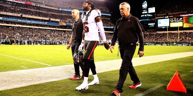 PHILADELPHIA, PENNSYLVANIA - OCTOBER 14: Richard Sherman #5 of the Tampa Bay Buccaneers walks off the field in the first half after being injured against the Philadelphia Eagles at Lincoln Financial Field on October 14, 2021 in Philadelphia, Pennsylvania. (Photo by Tim Nwachukwu/Getty Images)