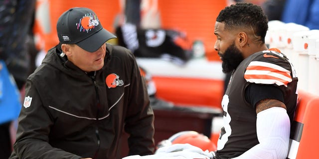 Odell Beckham Jr. (13) of the Cleveland Browns is tended to by medical personnel after a shoulder injury during the second quarter against the Arizona Cardinals at FirstEnergy Stadium Oct. 17, 2021 in Cleveland, Ohio. 