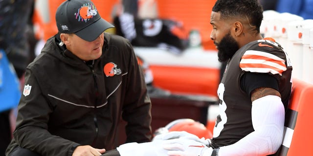 Odell Beckham Jr. (13) of the Cleveland Browns is tended to by medical personnel after a shoulder injury during the second quarter against the Arizona Cardinals at FirstEnergy Stadium Oct. 17, 2021 in Cleveland, Ohio.
