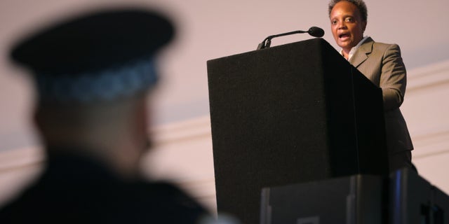 CHICAGO, ILLINOIS - OCTOBER 20: Chicago Mayor Lori Lightfoot speaks at a Chicago Police Department promotion and graduation ceremony on October 20, 2021 in Chicago, Illinois. The mayor has been sparring with the union that represents Chicago police after the city ordered police to state their COVID-19 vaccination status. With only about 65 percent of the city's police in compliance the city has started to place those who have not on unpaid leave. (Photo by Scott Olson/Getty Images)