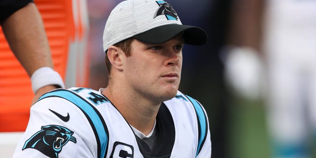 Sam Darnold #14 of the Carolina Panthers reacts on the bench during the second half in the game against the New York Giants at MetLife Stadium on October 24, 2021 in East Rutherford, New Jersey.