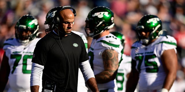 New York Jets Head Coach Robert Saleh walks the sideline during the game against the New England Patriots at Gillette Stadium on October 24, 2021 in Foxborough, Massachusetts.