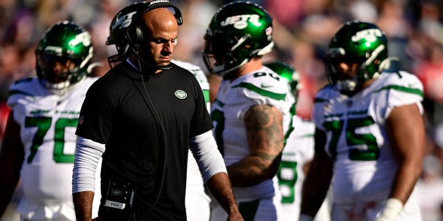 Head coach Robert Saleh of the New York Jets paces the side line during the game against the New England Patriots at Gillette Stadium on October 24, 2021 in Foxborough, Massachusetts.