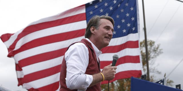 AMHERST, VIRGINIA - OCTOBER 28: Virginia Republican gubernatorial candidate Glenn Youngkin delivers remarks at a campaign event in the parking lot of Vito's Pizza Bar & Grill on October 28, 2021 in Amherst, Virginia. Youngkin is on a campaign bus tour across the state of Virginia as he contests Democratic candidate and former Virginia Gov. Terry McAuliffe in the state election that is less than a week away on November 2. (Photo by Anna Moneymaker/Getty Images)