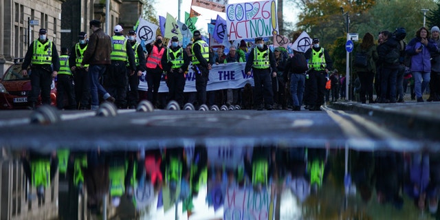 GLASGOW, SCOTLAND - OCTOBER 30: Pilgrim groups that have gone to Glasgow will be joined by members of the group, Extinction Rebellion, as they go to raise awareness of the climate crisis on October 30, 2021 in Glasgow, Scotland.