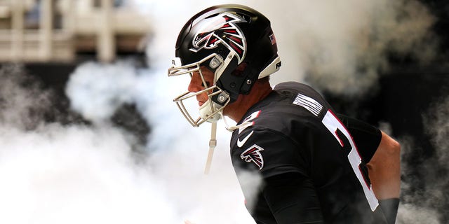 Matt Ryan of the Atlanta Falcons takes the field against the Carolina Panthers at Mercedes-Benz Stadium on Oct. 31, 2021, in Atlanta, Georgia.