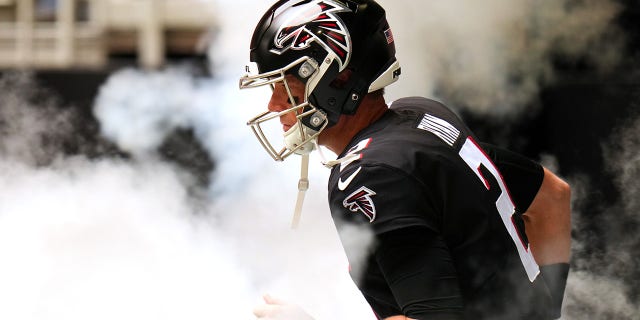 Matt Ryan of the Atlanta Falcons takes the field against the Carolina Panthers at Mercedes-Benz Stadium on Oct. 31, 2021, in Atlanta, Georgia.