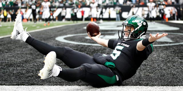 Mike White (5) of the New York Jets celebrates after catching the ball for a two-point conversion during the fourth quarter against the Cincinnati Bengals at MetLife Stadium Oct. 31, 2021 in East Rutherford, N.J. 