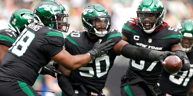 Shaq Lawson (50) of the New York Jets celebrates after making an interception during the fourth quarter against the Cincinnati Bengals at MetLife Stadium Oct. 31, 2021 in East Rutherford, N.J. 