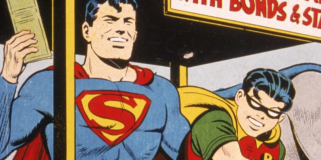 Cover illustration for 'World's Finest Comics,' with Superman, Batman and Robin selling US War Bonds to sink the 'Japanazis' in World War II, 1940s. (Photo by Hulton Archive/Getty Images)