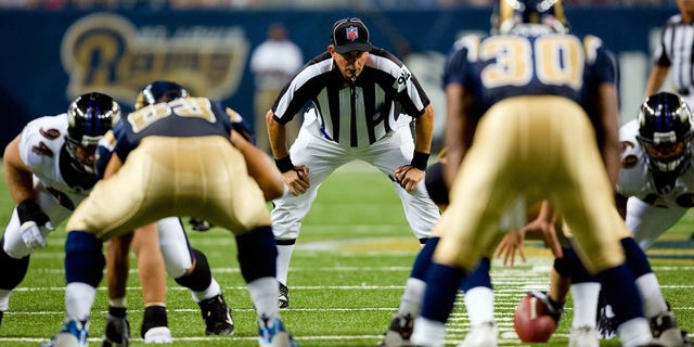 NFL Umpire Carl Madsen stands in position during game action between the St. Louis Rams and the Baltimore Ravens at the Edward Jones Dome on Aug. 23, 2008 in St. Louis, Missouri. (Photo by Dilip Vishwanat/Getty Images)