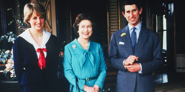 Lady Diana Spencer and Prince Charles pose with Queen Elizabeth at Buckingham Palace, London, in March 1981, the day that their wedding was sanctioned by the Privy Council.