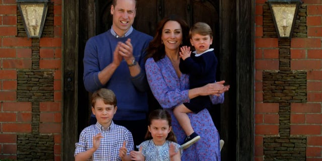 In this screengrab, Prince William, Duke of Cambridge, Catherine Duchess of Cambridge, Prince George of Cambridge, Princess Charlotte of Cambridge and Prince Louis of Cambridge clap for NHS carers as part of the BBC Children In Need and Comic Relief 'Big Night In at London on April 23, 2020 in London, England. The 'Big Night In' brings the nation an evening of unforgettable entertainment in a way we've never seen before. Raising money for and paying tribute to those on the front line fighting Covid-19 and all the unsung heroes supporting their communities. 