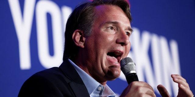 Virginia gubernatorial candidate Glenn Youngkin speaks during a campaign event in McLean, Virginia, July 14, 2021. REUTERS/Evelyn Hockstein/File Photo