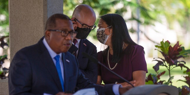 U.S. Ambassador to Haiti Michele Sison, right, talks with National Security Council Senior Director for the Western Hemisphere Juan Sebastian Gonzalez, as Assistant Secretary for Western Hemisphere Affairs Brian Nichols speaks during a news conference at the U.S. Embassy, in Port-au-Prince, Haiti, Friday, Oct. 1, 2021. 