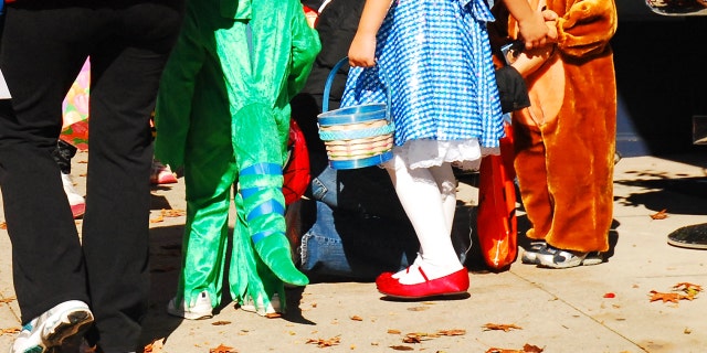 Costumes are a longtime Halloween tradition for children and adults.
