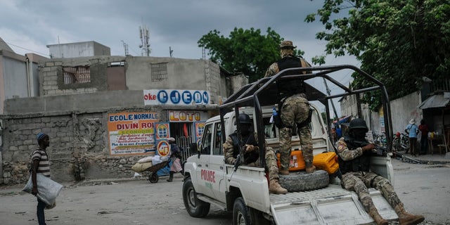 Security forces patrol the streets of Croix-des-Bouquets, near Port-au-Prince, Haiti, Tuesday, Oct. 19, 2021. (AP Photo/Matias Delacroix)