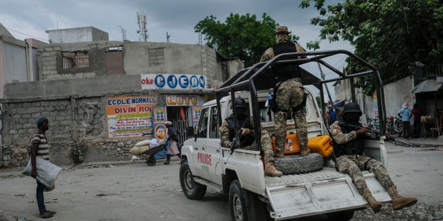 Security forces patrol the streets of Croix-des-Bouquets, near Port-au-Prince, Haiti, on Tuesday, October 19, 2021. (AP Photo / Matias Delacroix)
