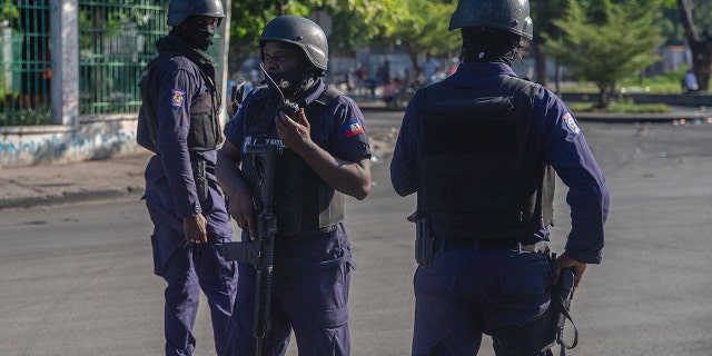 Armed forces secure the area where the Haiti's Prime Minister Ariel Henry placed a bouquet of flowers in front of independence hero Jean Jacques Dessalines memorial in Port-au-Prince, Haiti, on Sunday.